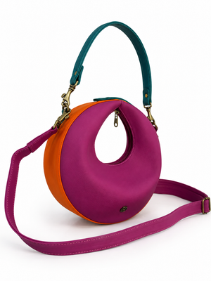 Cartera manos libres Sahara, color moraleche y naranja
