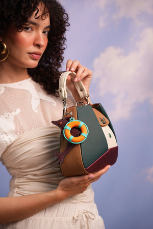 Cartera manos libres Dubai color verde y vinotinto de Hereje, colección Siete Colores