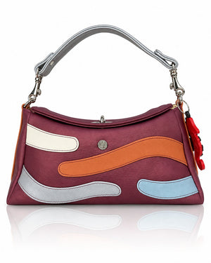Cartera manos libres Japón color vinotinto de Hereje, colección Siete Colores