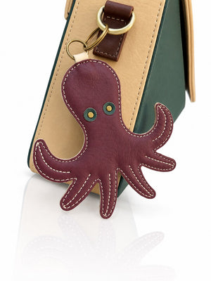 Cartera manos libres Nina color verde y beige de Hereje, colección Siete Colores