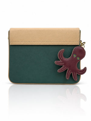 Cartera manos libres Nina color verde y beige de Hereje, colección Siete Colores
