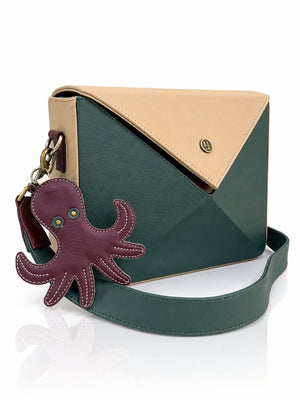 Cartera manos libres Nina color verde y beige de Hereje, colección Siete Colores