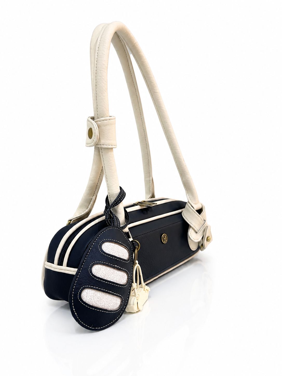 Cartera la Baguette mini, color negro y champagne