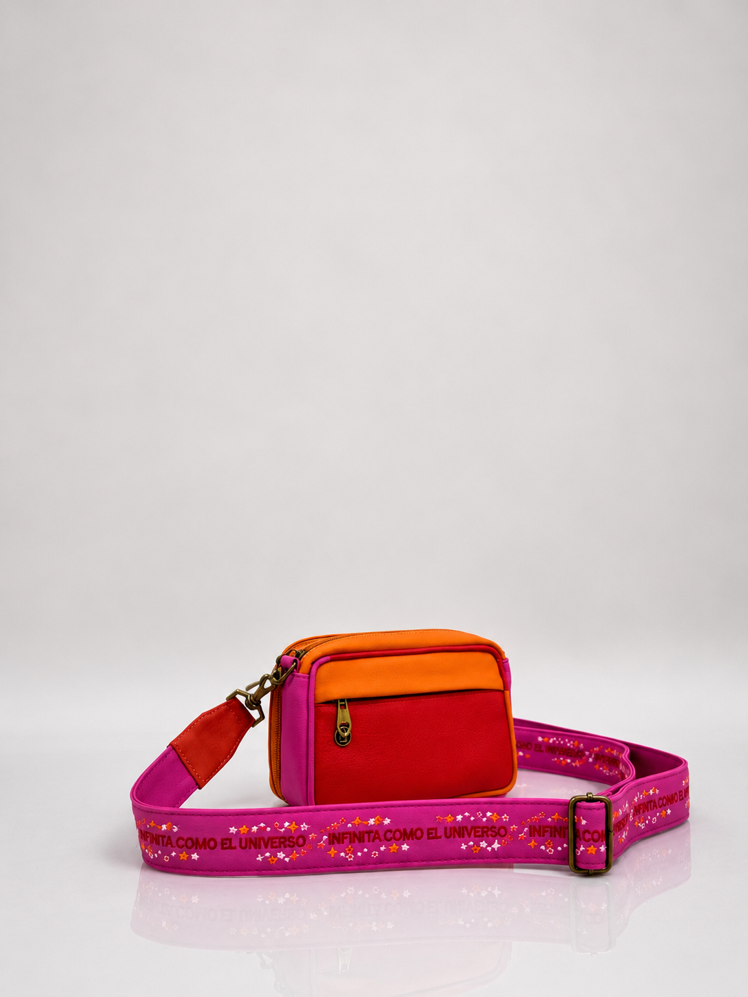 Manos libres Tiny, color naranja y rojo