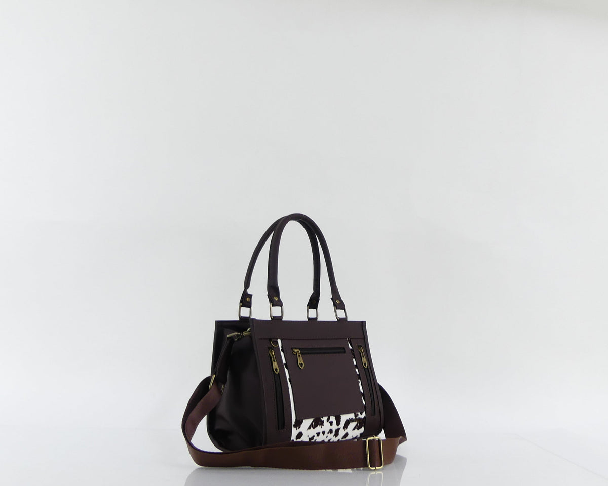 Cartera manos libres Totti mediana, color café y vaca