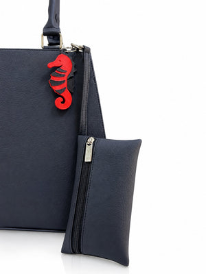 Cartera de mano Italia color negro de Hereje, colección Siete Colores