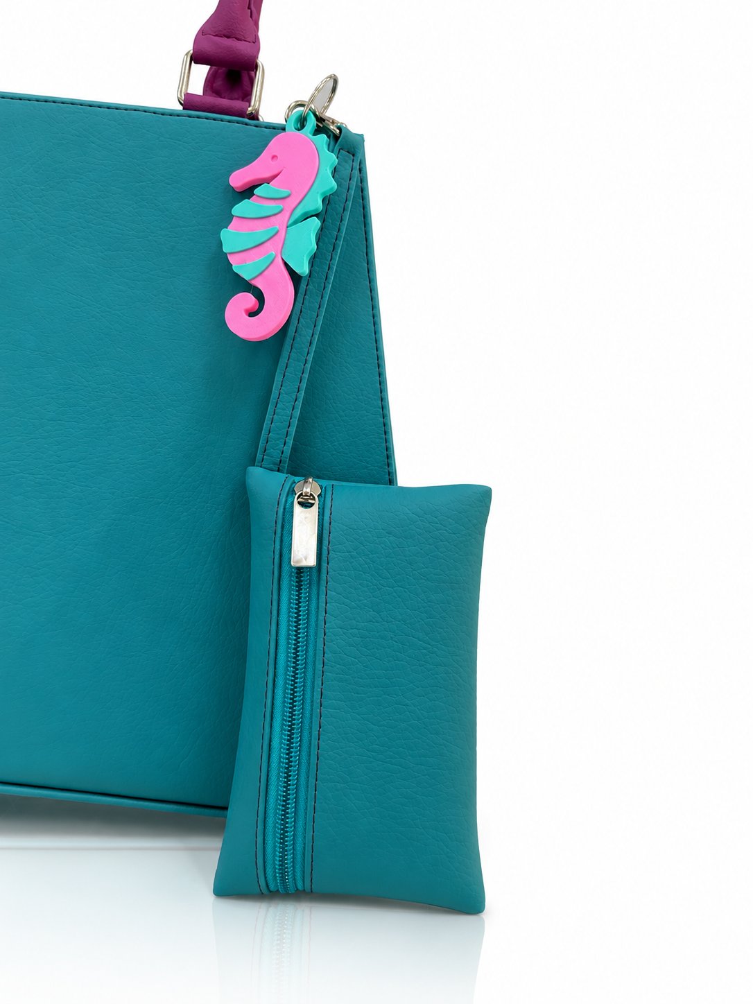 Cartera de mano Italia color turquesa de Hereje, colección Siete Colores