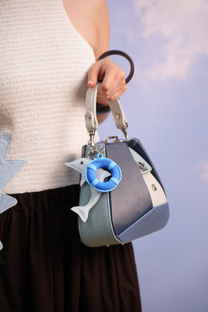 Cartera manos libres Dubai color azul de Hereje, colección Siete Colores