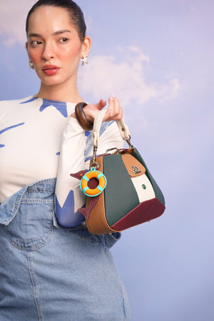 Cartera manos libres Dubai color verde y vinotinto de Hereje, colección Siete Colores