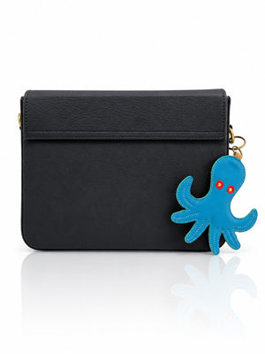 Cartera manos libres Nina color negro de Hereje, colección Siete Colores