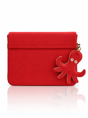 Cartera manos libres Nina color rojo de Hereje, colección Siete Colores