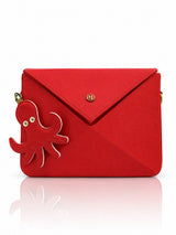 Cartera manos libres Nina color rojo de Hereje, colección Siete Colores