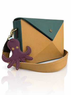 Cartera manos libres Nina color verde y mostaza de Hereje, colección Siete Colores